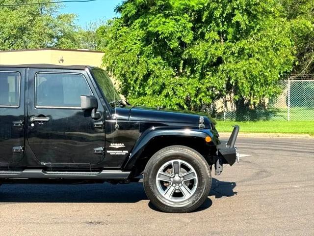 used 2014 Jeep Wrangler Unlimited car, priced at $17,395