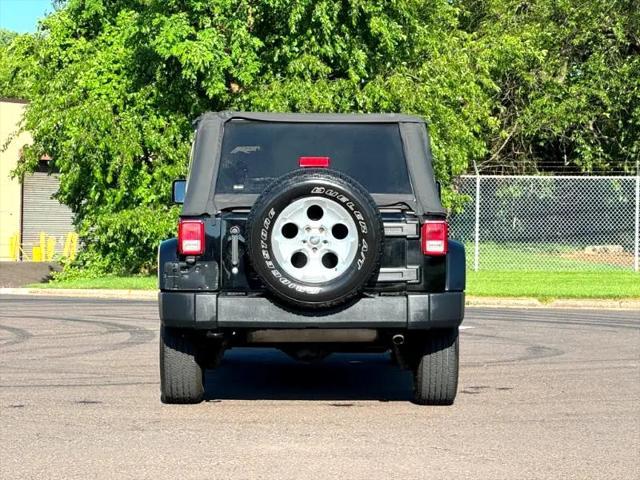 used 2014 Jeep Wrangler Unlimited car, priced at $17,395