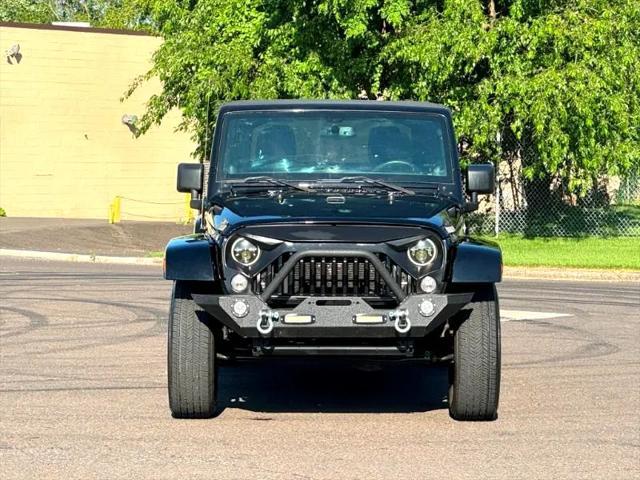 used 2014 Jeep Wrangler Unlimited car, priced at $17,395