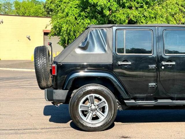 used 2014 Jeep Wrangler Unlimited car, priced at $17,395