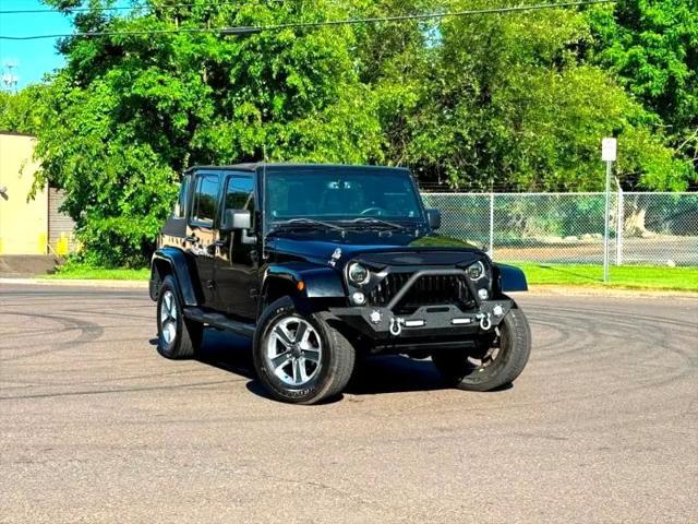 used 2014 Jeep Wrangler Unlimited car, priced at $17,395