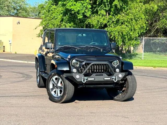 used 2014 Jeep Wrangler Unlimited car, priced at $17,395