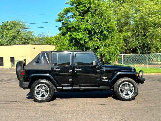 used 2014 Jeep Wrangler Unlimited car, priced at $17,395