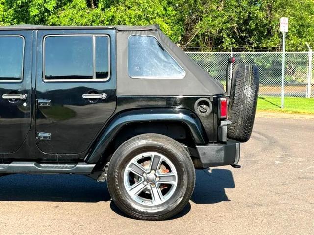 used 2014 Jeep Wrangler Unlimited car, priced at $17,395