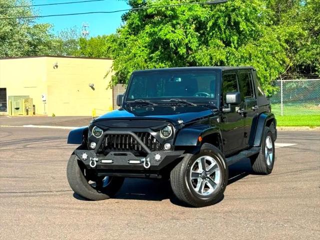 used 2014 Jeep Wrangler Unlimited car, priced at $17,395