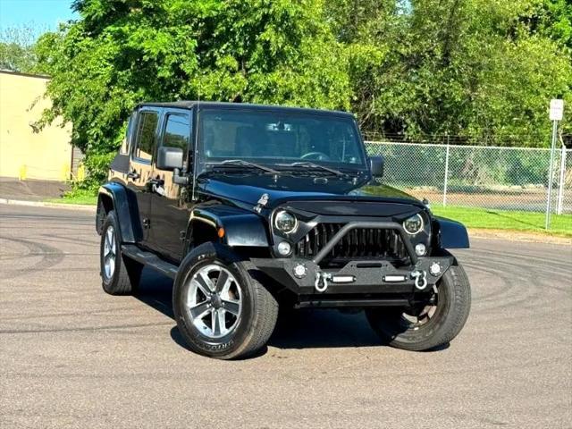 used 2014 Jeep Wrangler Unlimited car, priced at $17,395