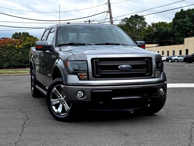 used 2014 Ford F-150 car, priced at $18,795