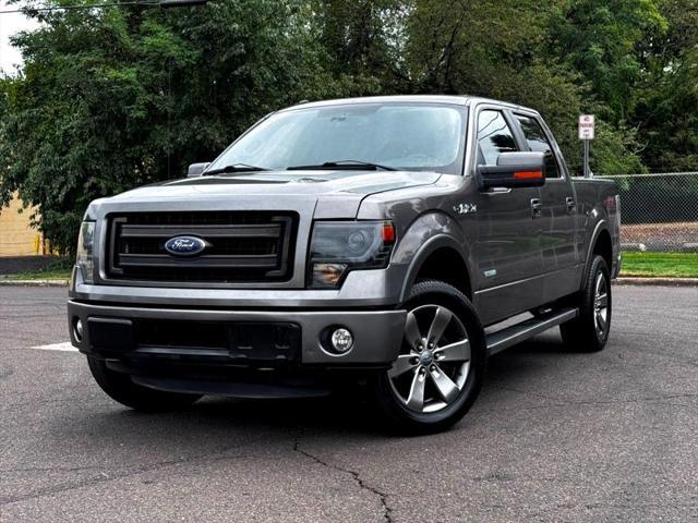 used 2014 Ford F-150 car, priced at $18,795