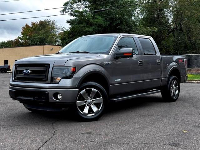 used 2014 Ford F-150 car, priced at $18,795