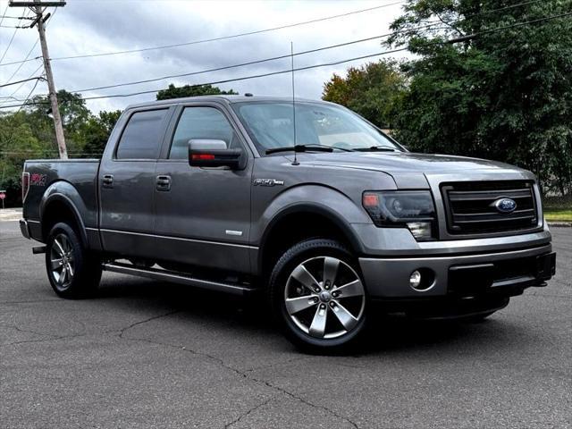 used 2014 Ford F-150 car, priced at $18,795