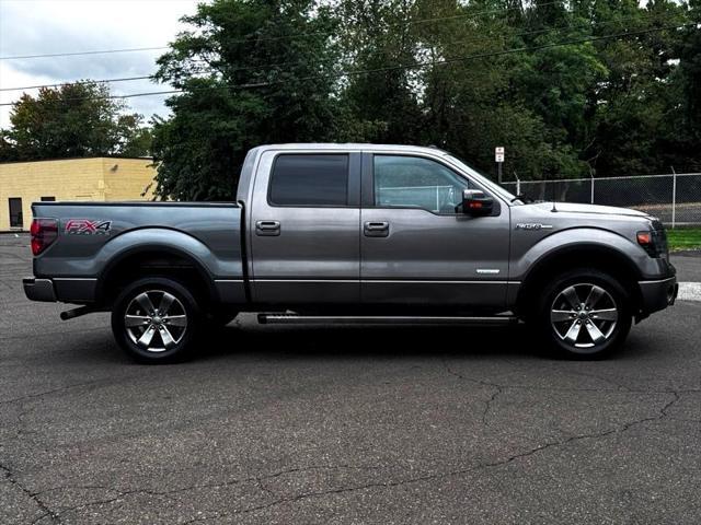 used 2014 Ford F-150 car, priced at $18,795