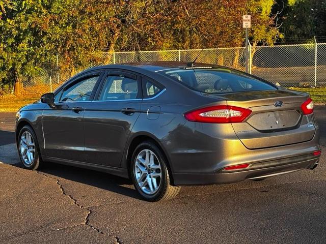 used 2014 Ford Fusion car, priced at $9,995