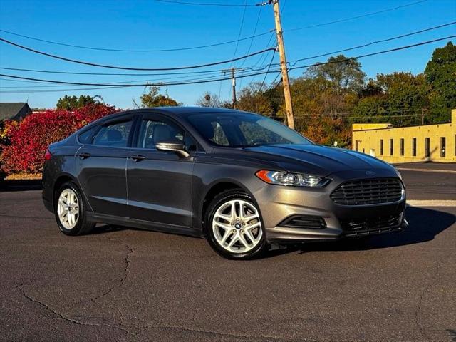 used 2014 Ford Fusion car, priced at $9,995