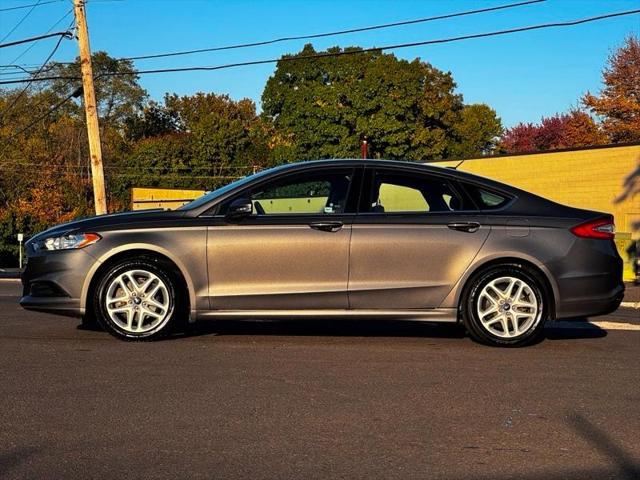 used 2014 Ford Fusion car, priced at $9,995