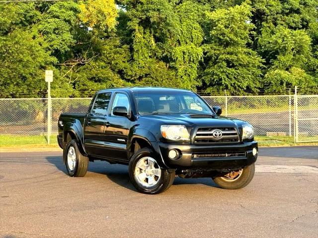 used 2010 Toyota Tacoma car, priced at $11,395