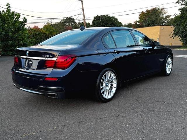 used 2013 BMW 750 car, priced at $13,495