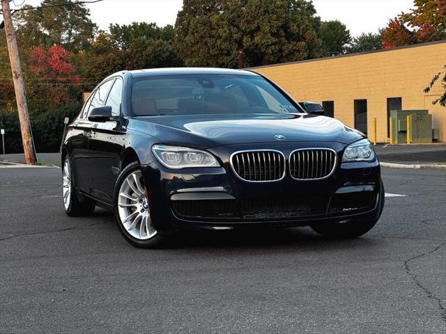 used 2013 BMW 750 car, priced at $13,495