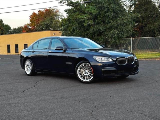 used 2013 BMW 750 car, priced at $13,495