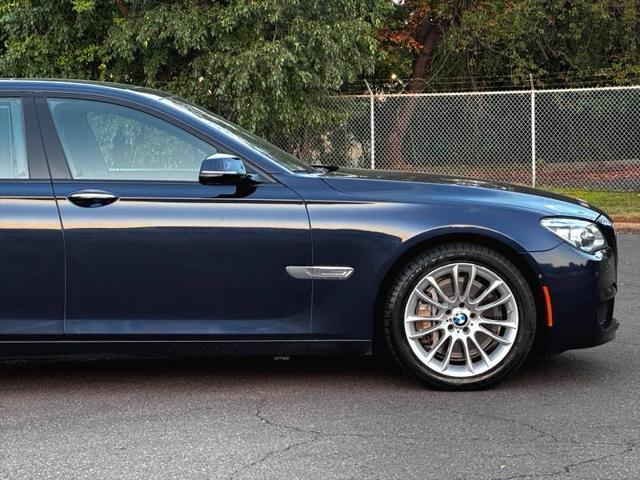 used 2013 BMW 750 car, priced at $13,495