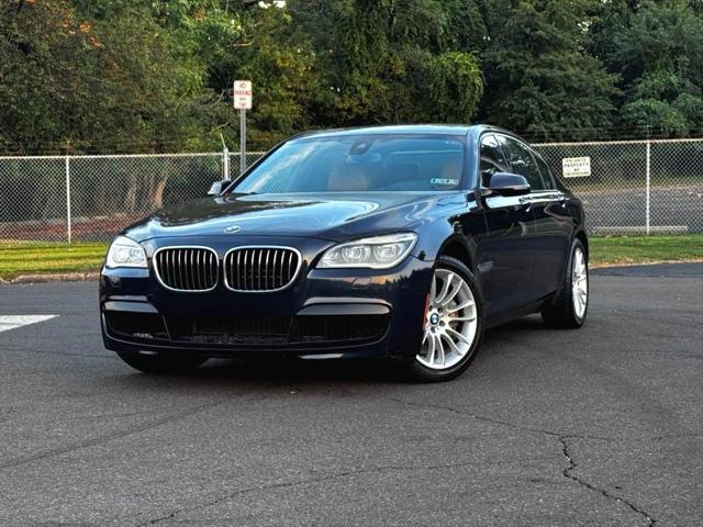 used 2013 BMW 750 car, priced at $13,495