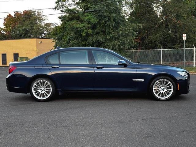 used 2013 BMW 750 car, priced at $13,495