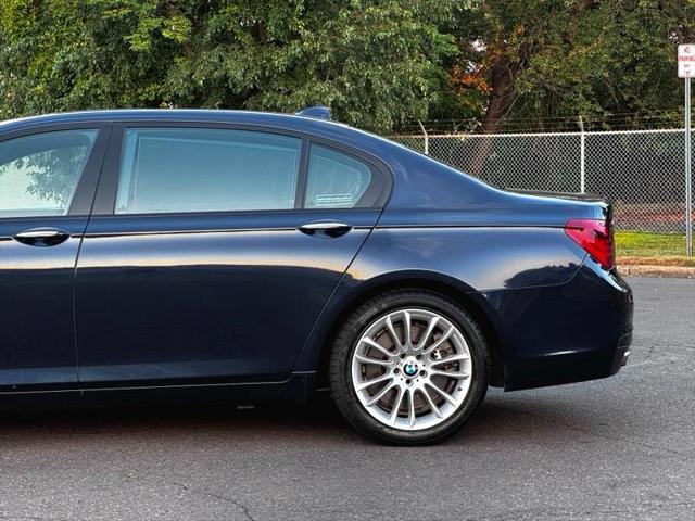 used 2013 BMW 750 car, priced at $13,495