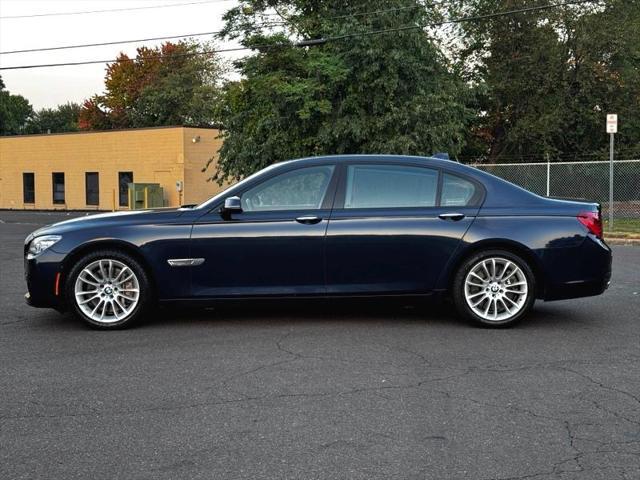 used 2013 BMW 750 car, priced at $13,495