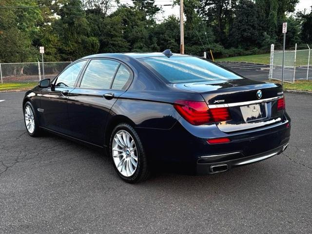 used 2013 BMW 750 car, priced at $13,495