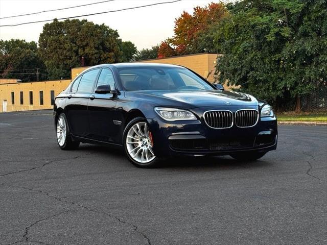 used 2013 BMW 750 car, priced at $13,495