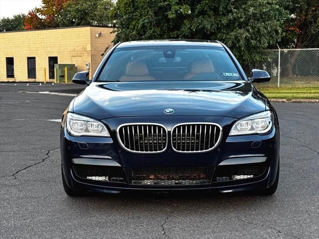 used 2013 BMW 750 car, priced at $13,495