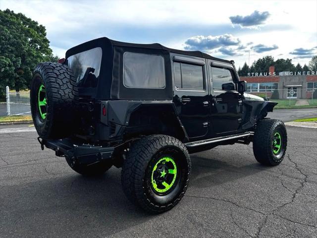 used 2016 Jeep Wrangler Unlimited car, priced at $28,395