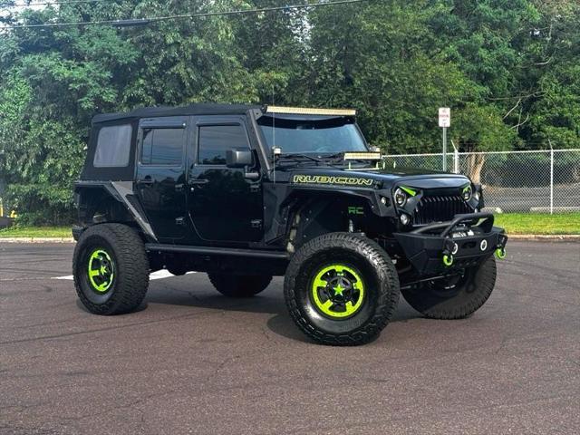 used 2016 Jeep Wrangler Unlimited car, priced at $28,395