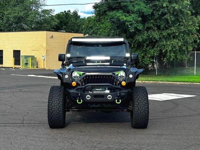 used 2016 Jeep Wrangler Unlimited car, priced at $28,395