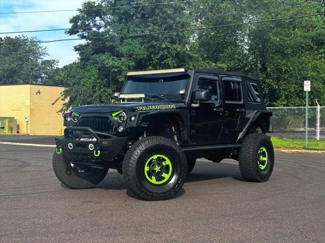 used 2016 Jeep Wrangler Unlimited car, priced at $28,395