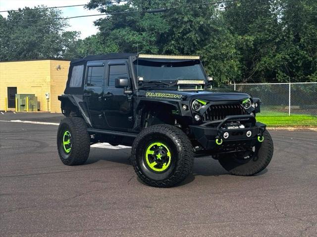 used 2016 Jeep Wrangler Unlimited car, priced at $28,395