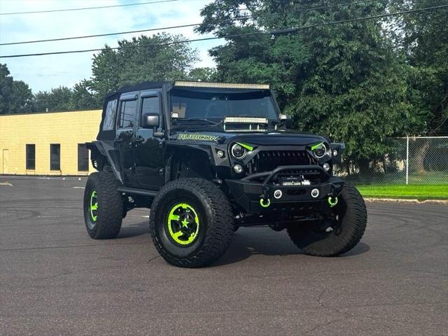 used 2016 Jeep Wrangler Unlimited car, priced at $28,395