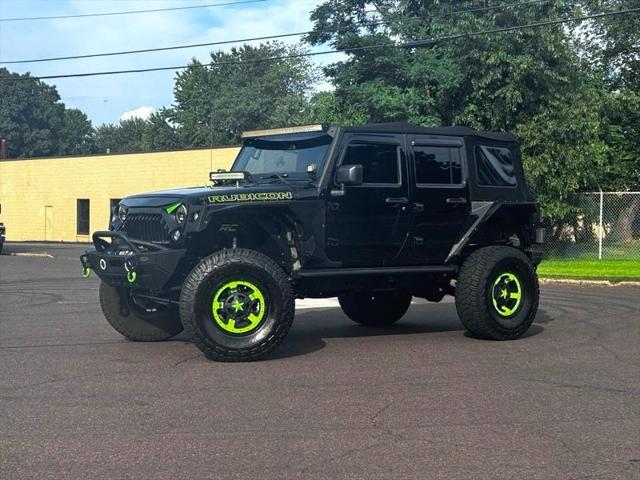 used 2016 Jeep Wrangler Unlimited car, priced at $28,395