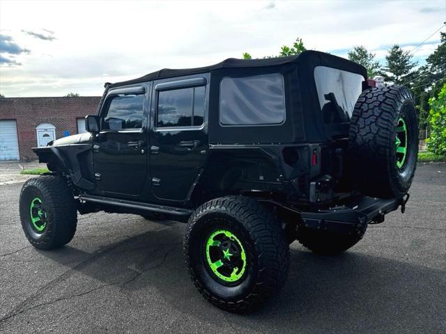 used 2016 Jeep Wrangler Unlimited car, priced at $28,395