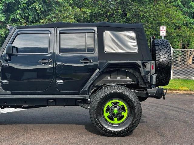 used 2016 Jeep Wrangler Unlimited car, priced at $28,395