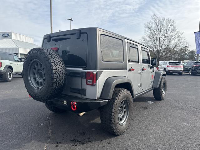 used 2014 Jeep Wrangler Unlimited car, priced at $17,500