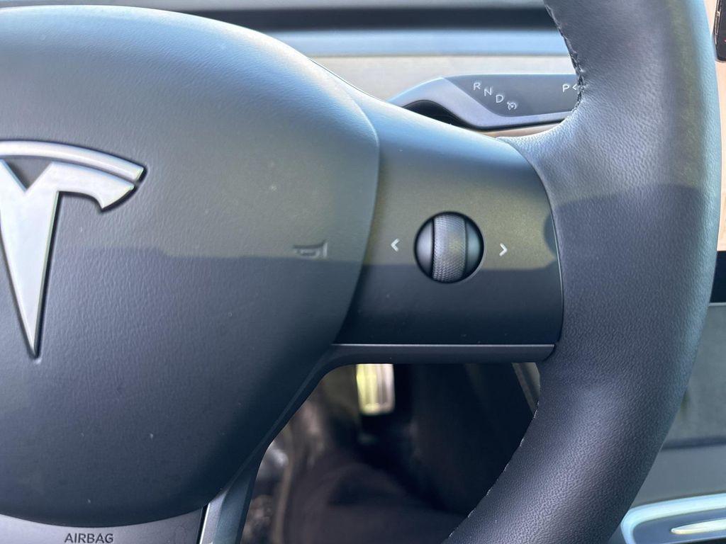 used 2023 Tesla Model Y car, priced at $32,950