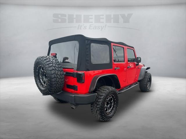 used 2015 Jeep Wrangler Unlimited car, priced at $15,950