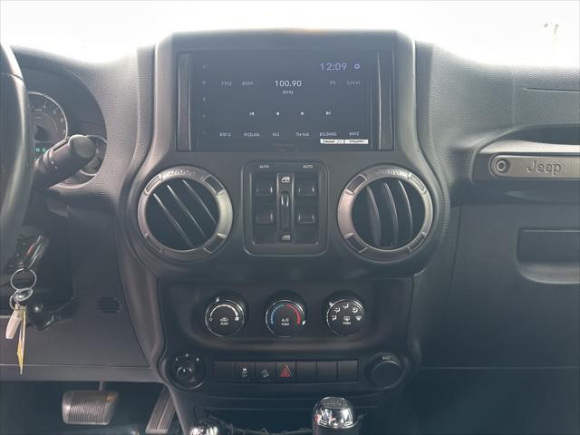 used 2015 Jeep Wrangler Unlimited car, priced at $15,950