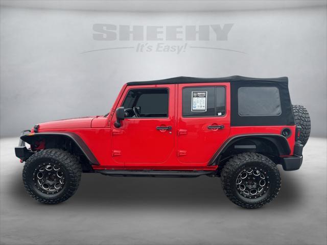 used 2015 Jeep Wrangler Unlimited car, priced at $15,950