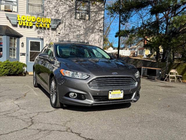 used 2014 Ford Fusion car, priced at $9,999