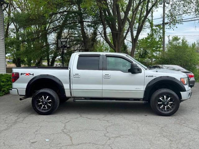 used 2011 Ford F-150 car, priced at $14,999