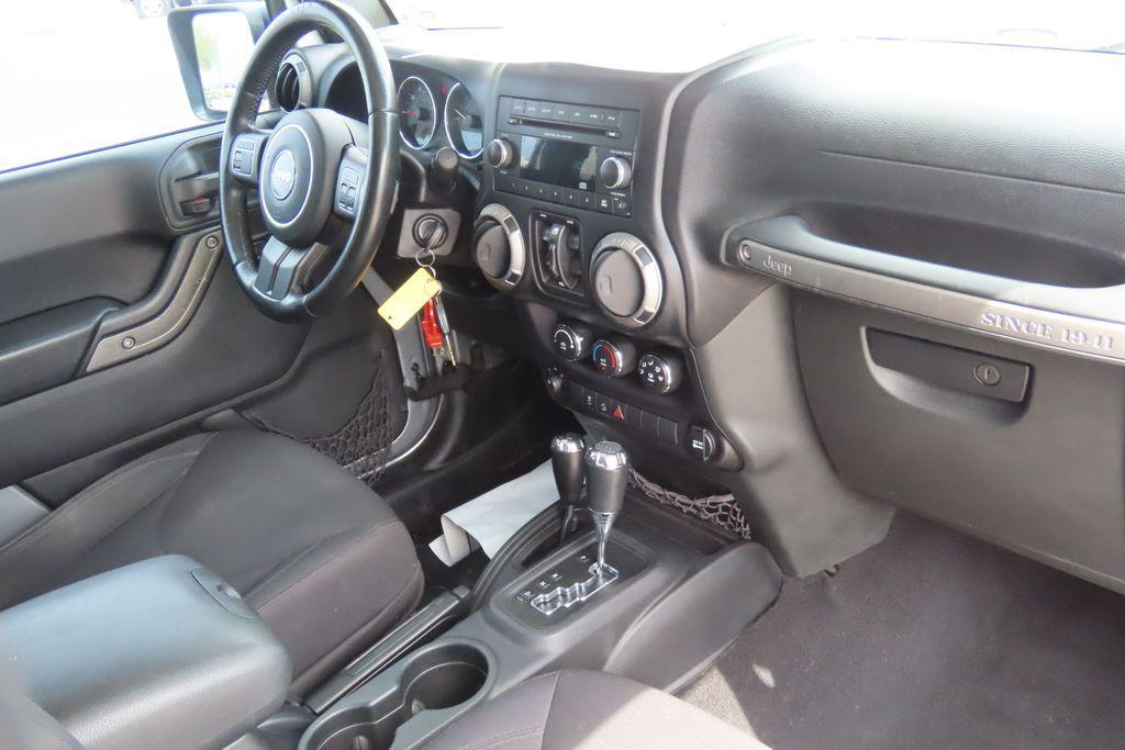 used 2015 Jeep Wrangler Unlimited car, priced at $15,447