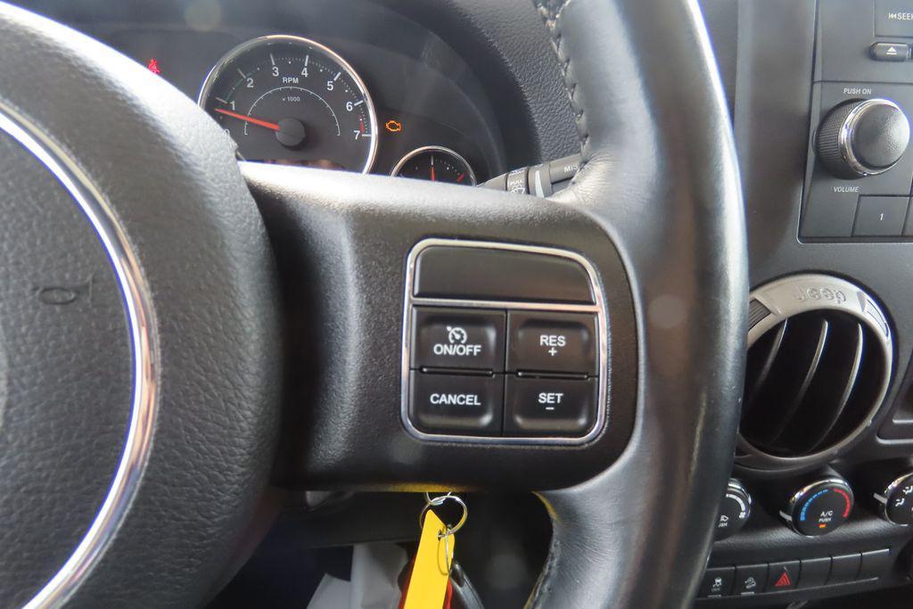 used 2015 Jeep Wrangler Unlimited car, priced at $15,447