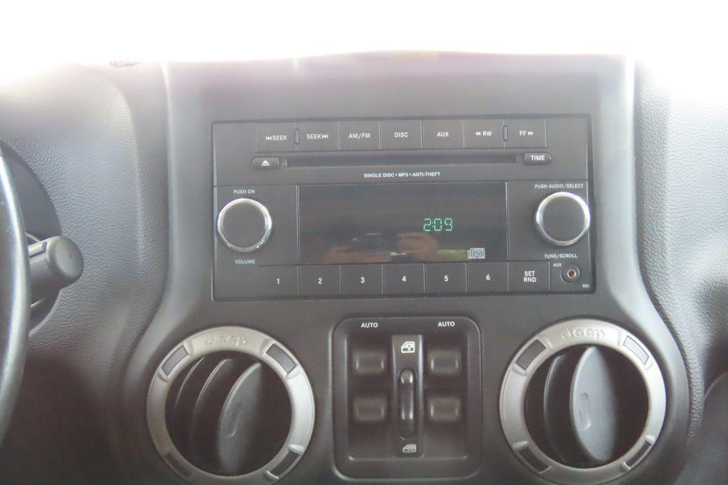 used 2015 Jeep Wrangler Unlimited car, priced at $15,447