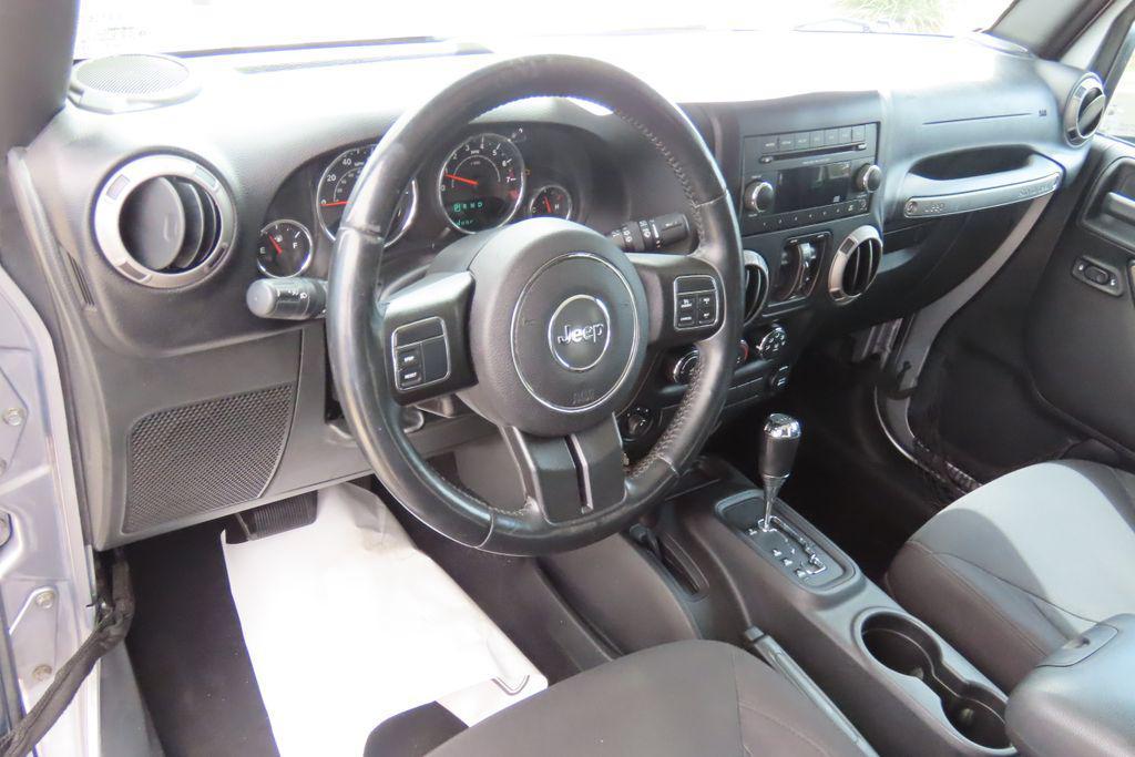 used 2015 Jeep Wrangler Unlimited car, priced at $15,447